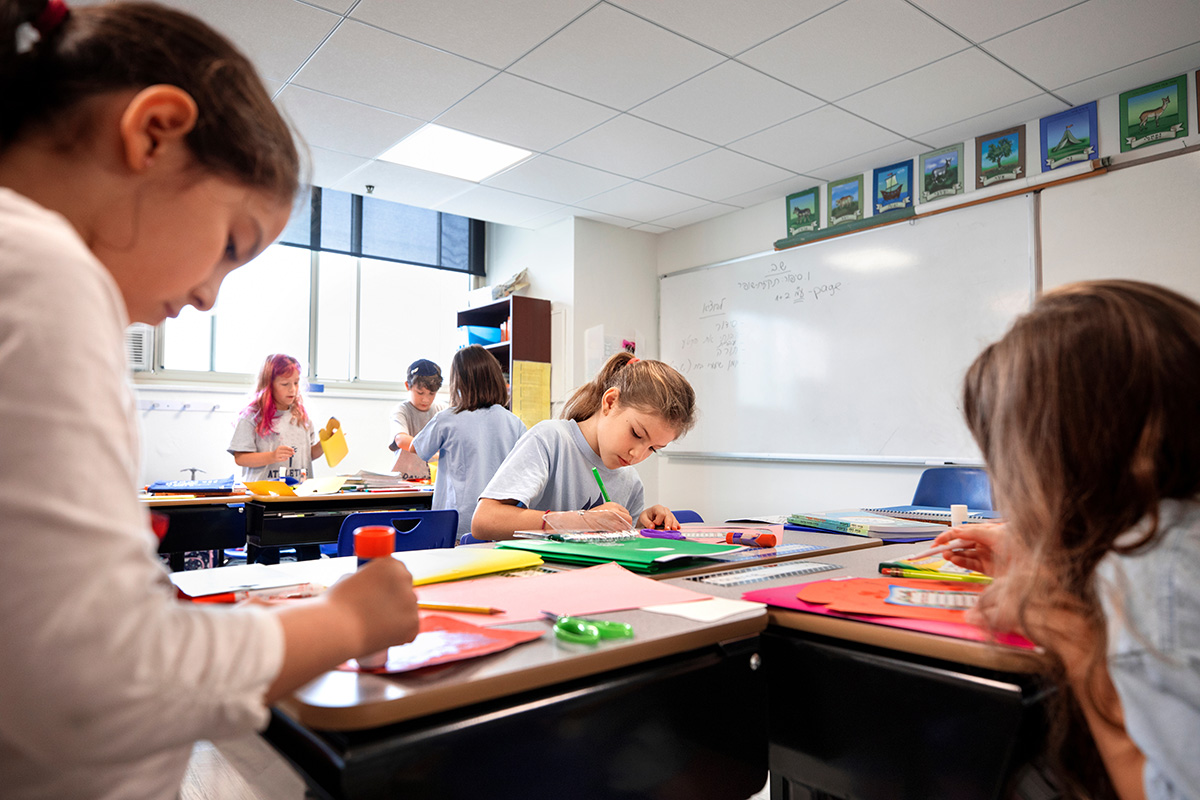 Children doing classwork in a classroom